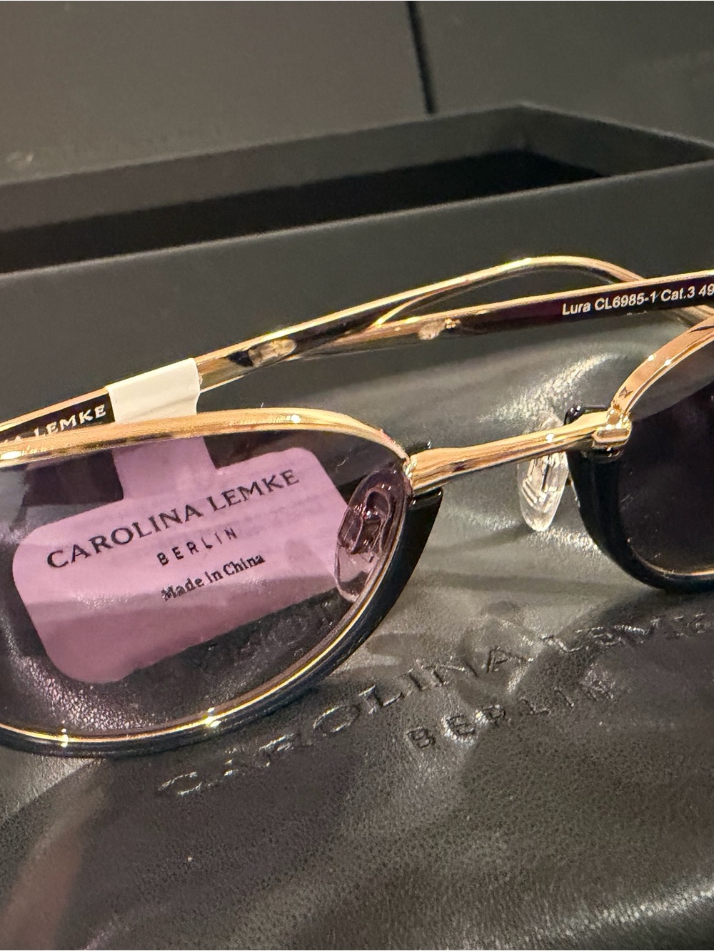 Carolina Lemke Gold Frame Sunglasses with Purple Lenses